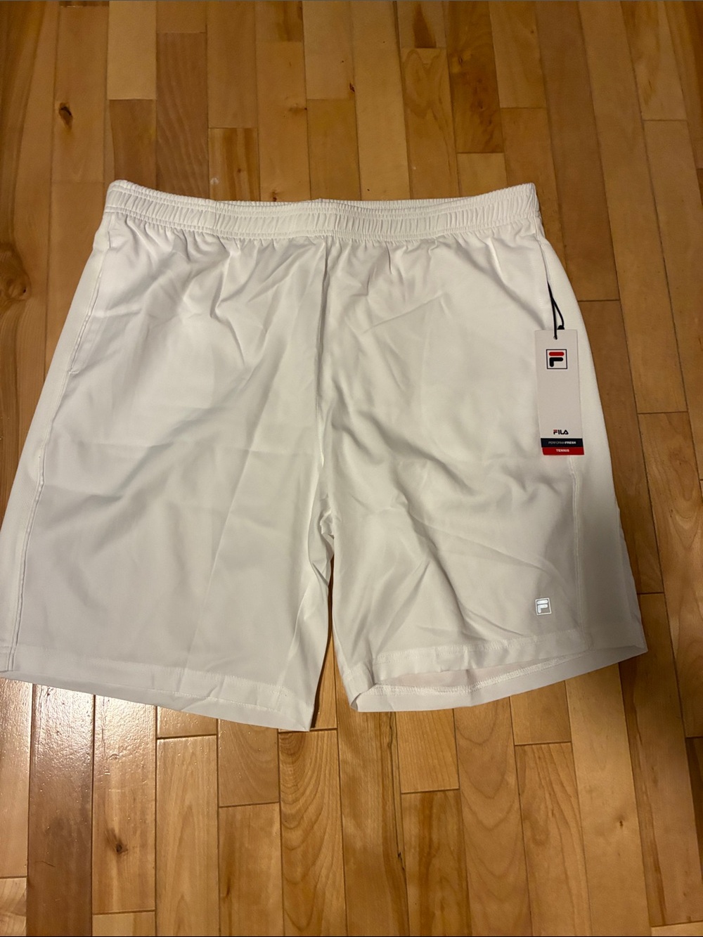 FILA Men's White Athletic Shorts with Subtle Logo